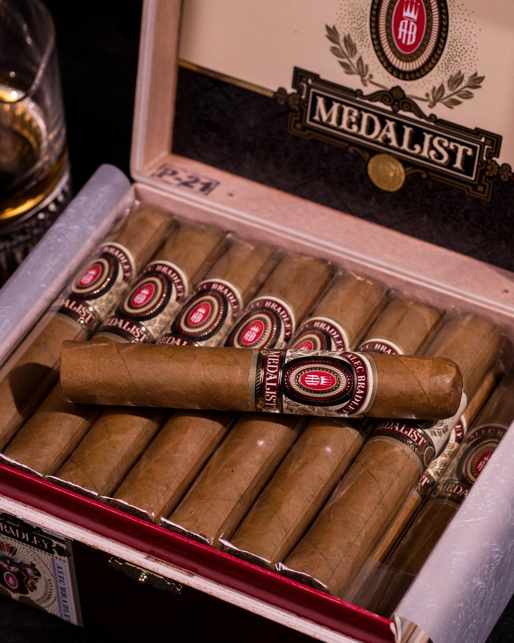 Open box of Medalist cigars with cigars inside, featuring the Medalist logo.