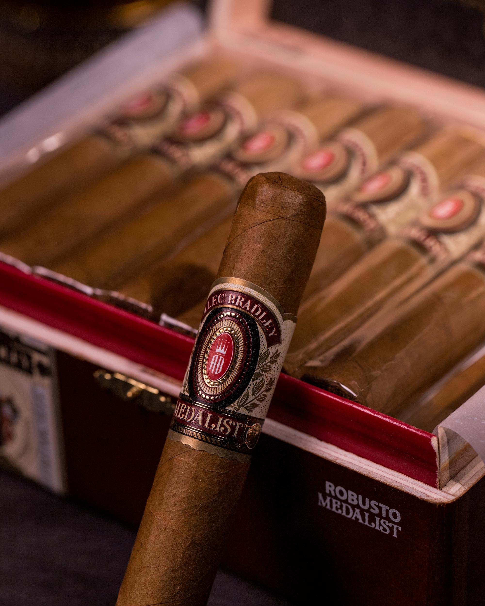 Cigar with 'Medalist' label on a Humidor