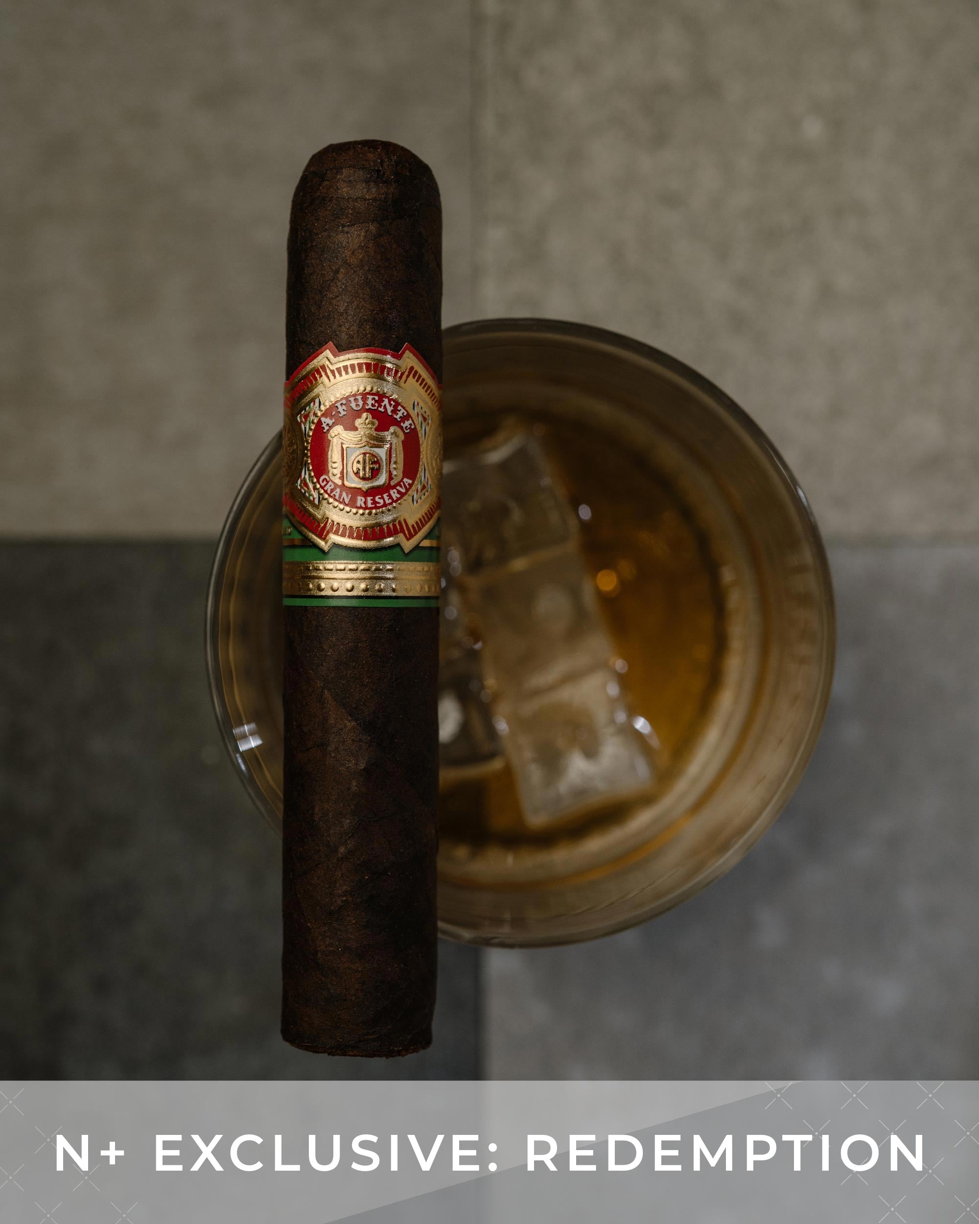 Cigar with a brand label on a gray background