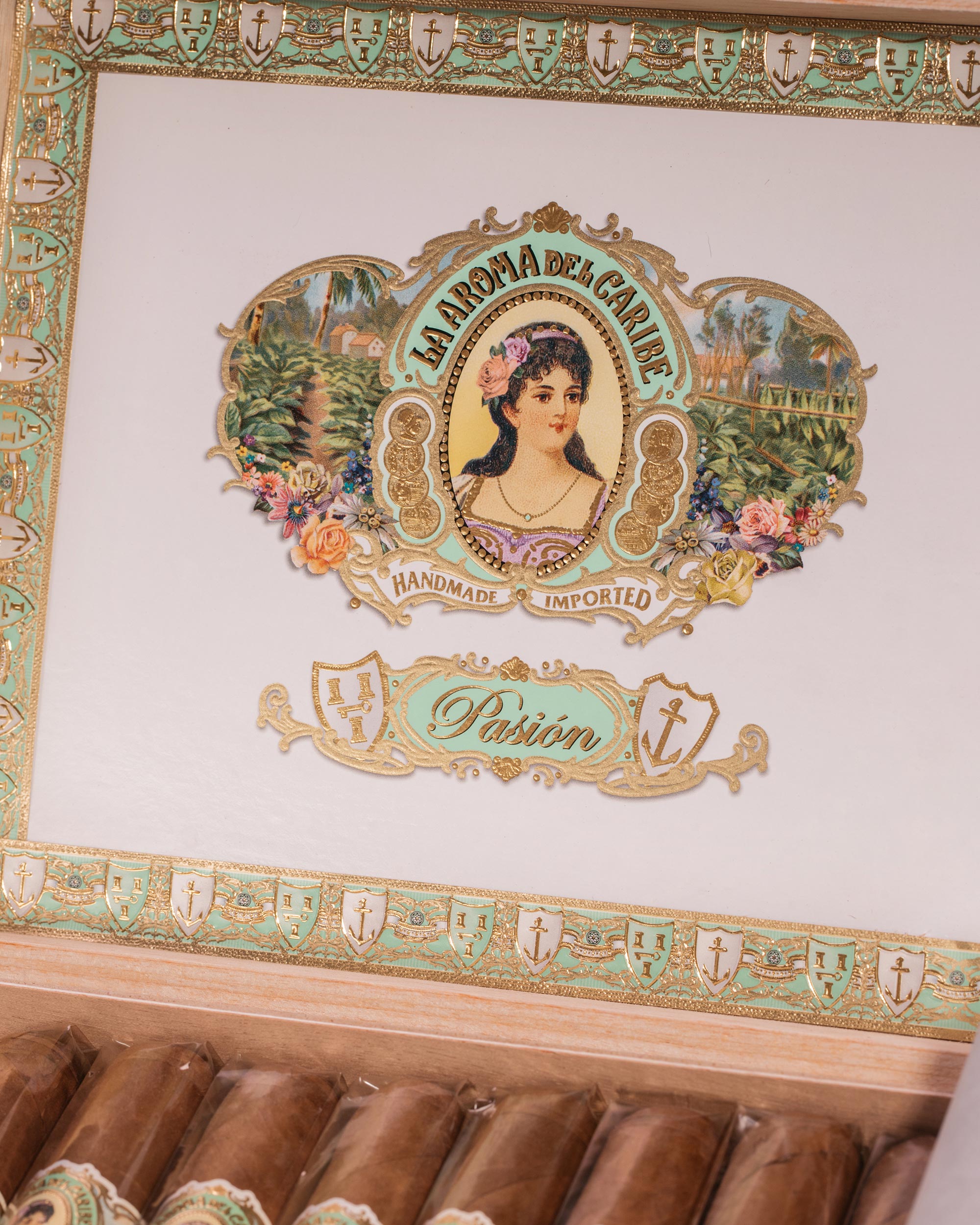 Decorative cigar box with intricate design and 'La Roma del Caribe' branding.