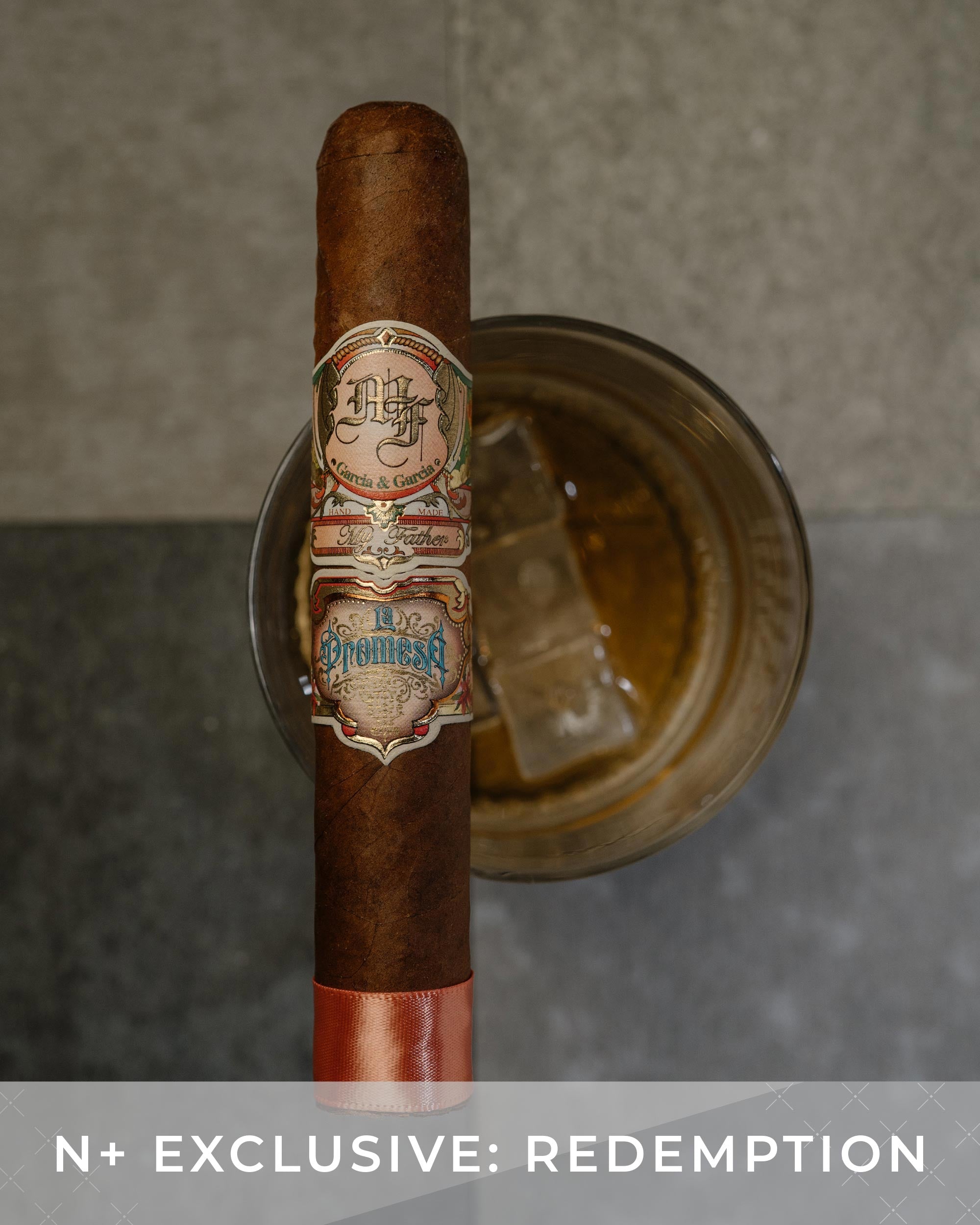 Cigar with a label on a metallic stand against a neutral background