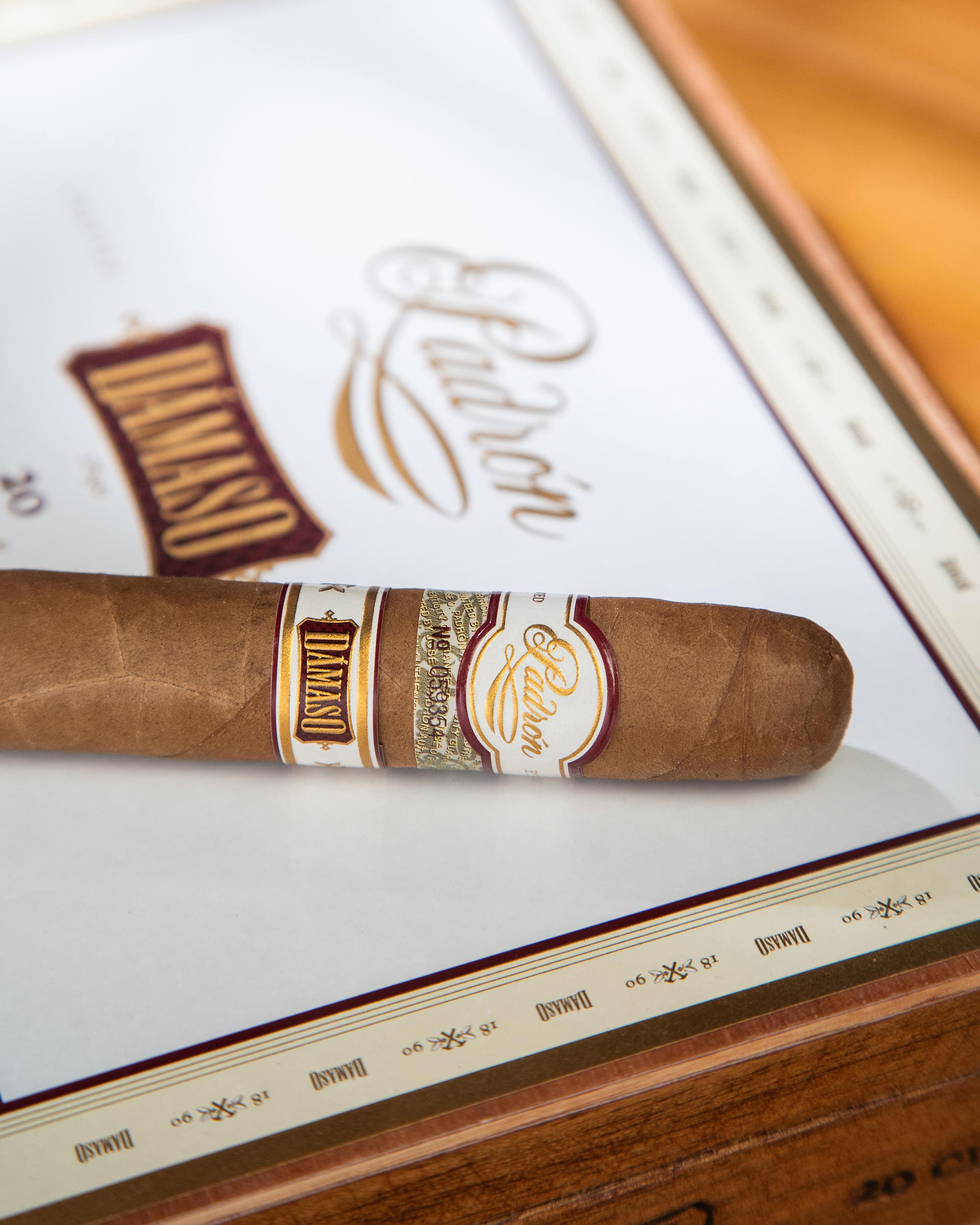 Cigar with a label on a branded box