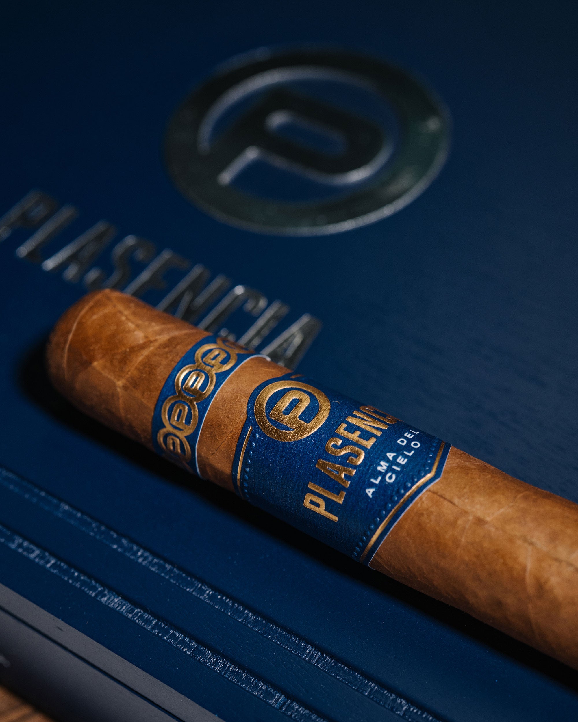 Cigar with blue label on a blue background