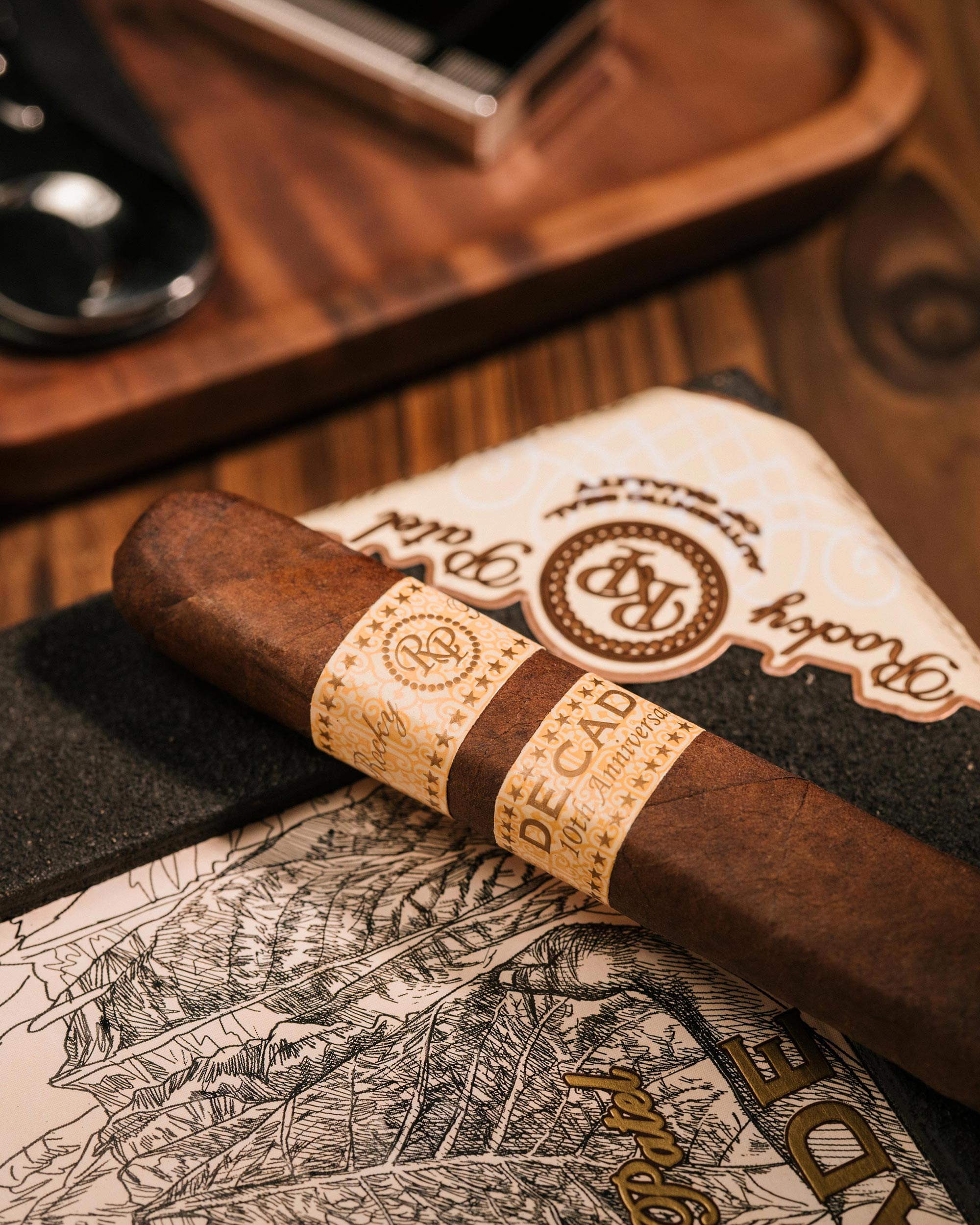 Cigar with a label on a decorative surface
