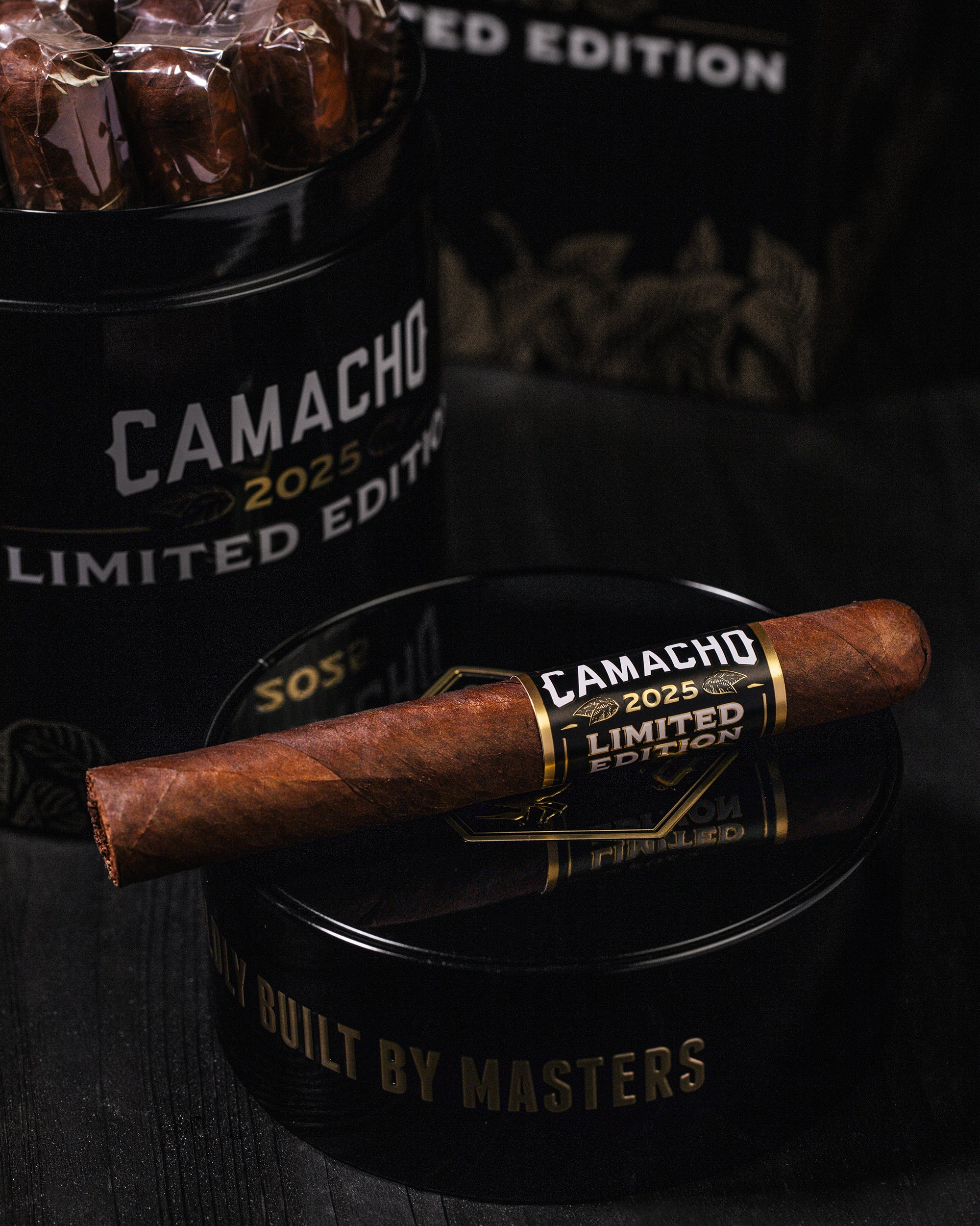 Camacho 2025 Limited Edition cigars with packaging on a dark background
